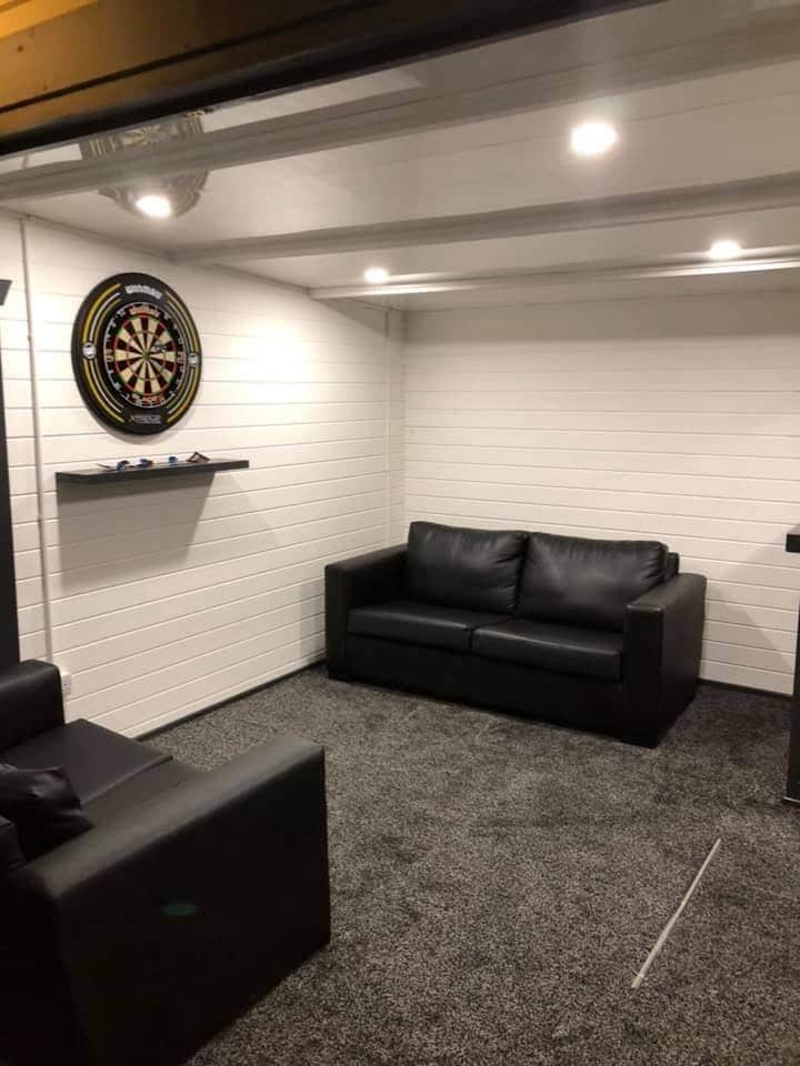 Converted Log Cabin with Dart Boards